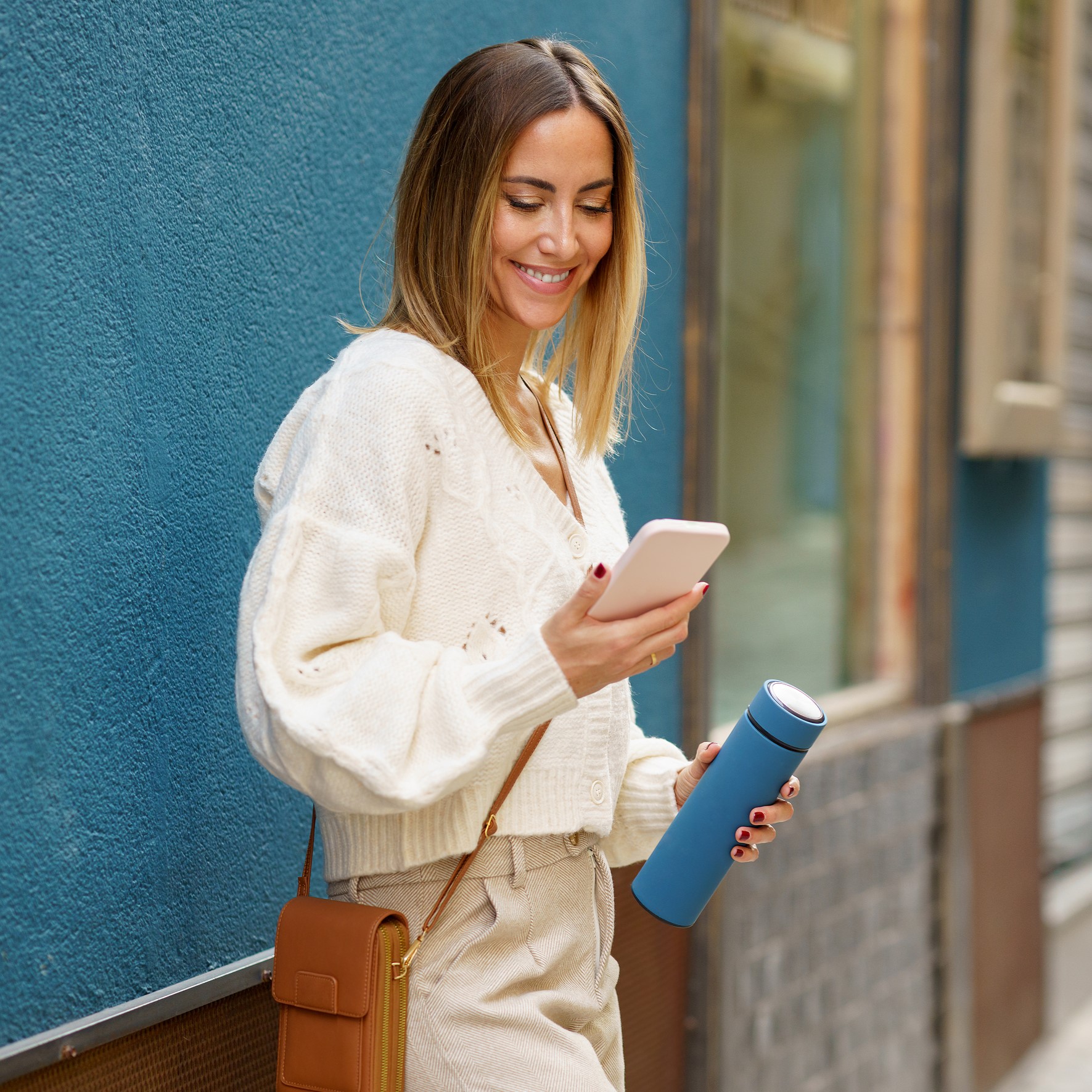Why Do I Need an Ultrasound? A woman searching on her phone "Why Do I Need an Ultrasound?"