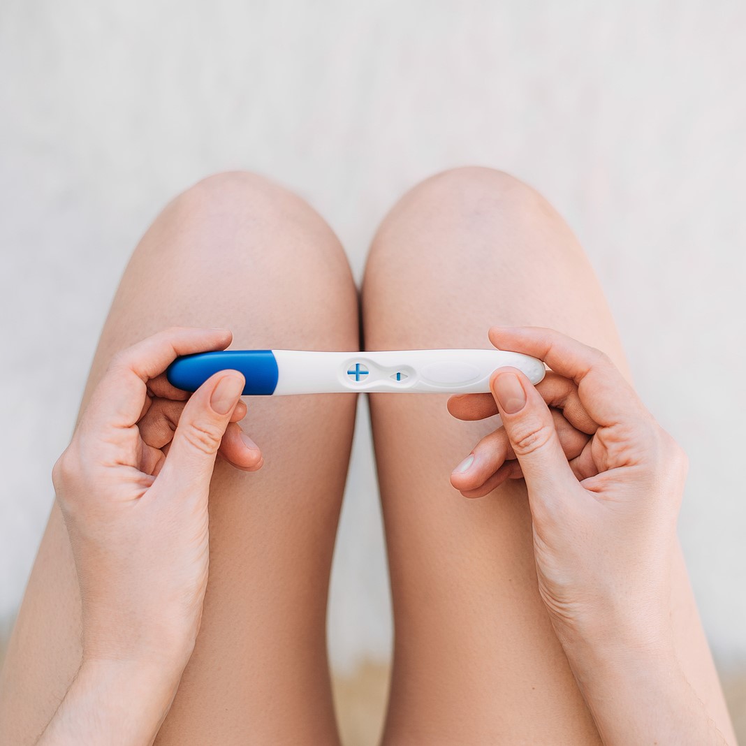 Free Pregnancy Tests A woman holding a free pregnancy test in Greenville, Kentucky